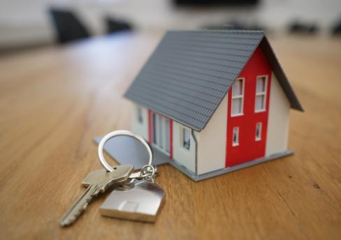 House keys with model house keyring