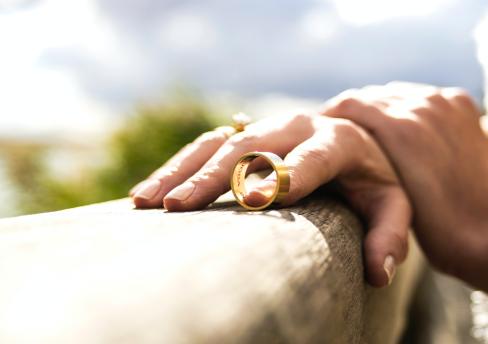 Divorce close-up ring near hand
